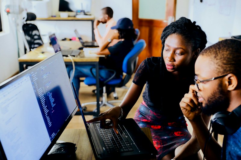Onsite technical team collaborating in modern office